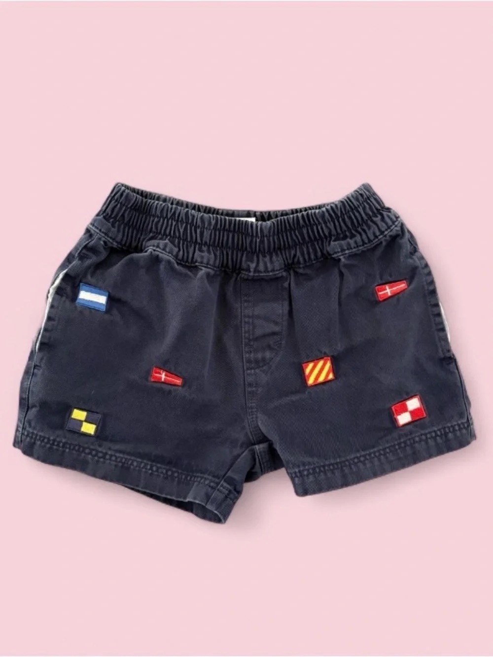 The Beaufort Bonnet Company Navy Kids Shorts with Nautical Flag Embroidery